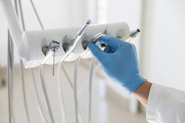 Professional Tooth Extraction technician working in Rochelle, IL